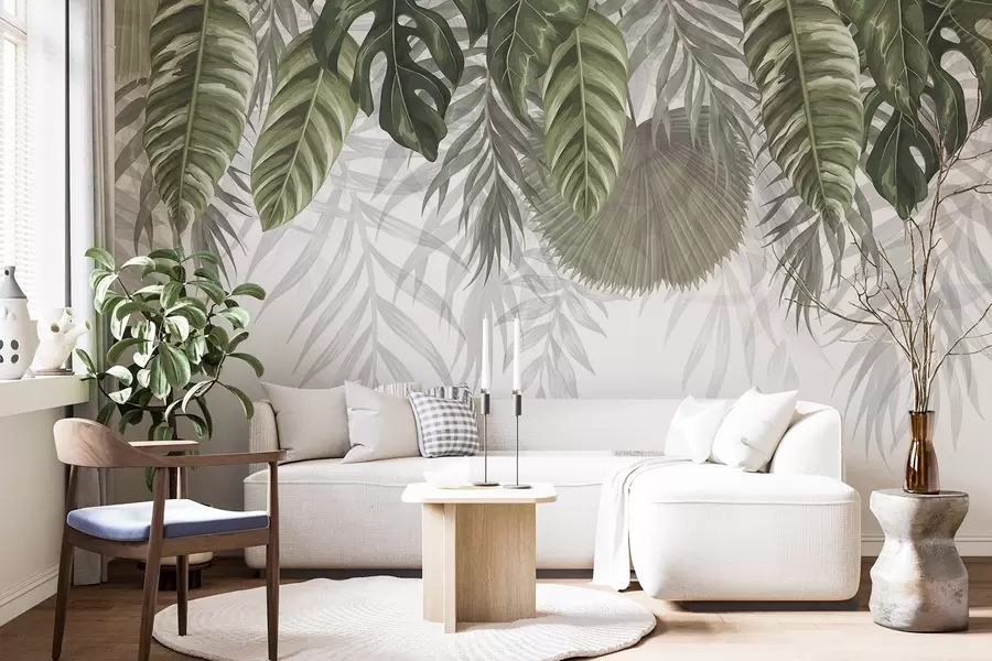 wall murals Tropical leaves in shades of green including large monstera leaves and palm fronds on white background w08443