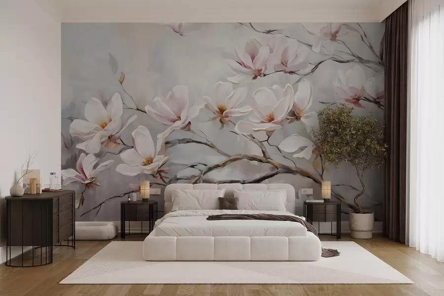 wall murals Delicate pink magnolia flowers blooming on bare tree branches against a soft, hazy background w08589