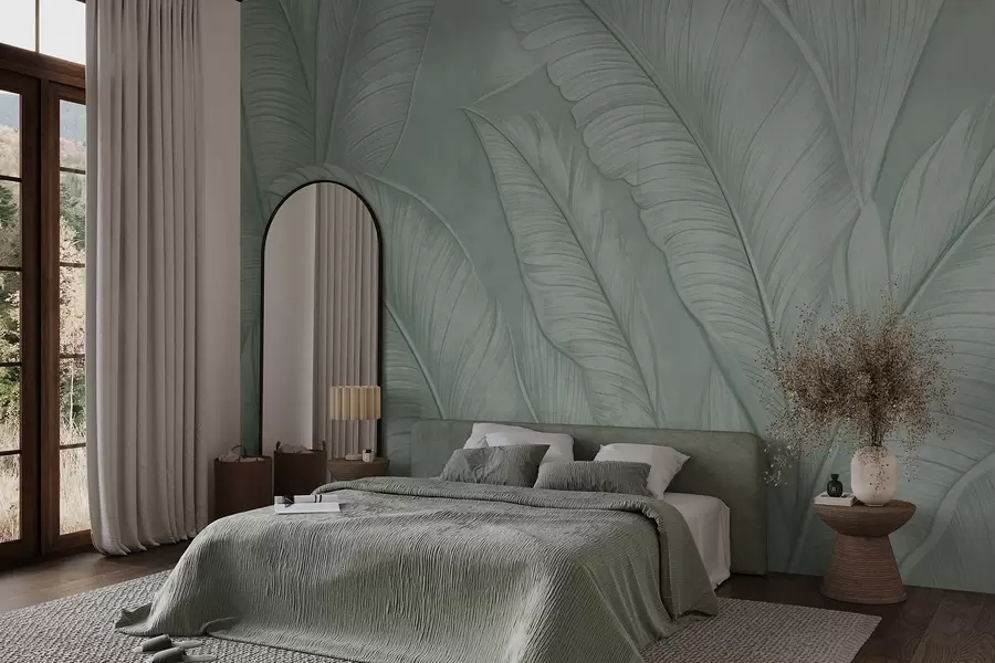 wall murals Highly-textured detailed large tropical leaves in a monochromatic green color in loft style w08772v1