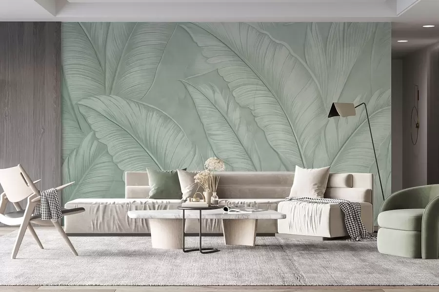 wall murals Highly-textured detailed large tropical leaves in a monochromatic green color in loft style w08772v1
