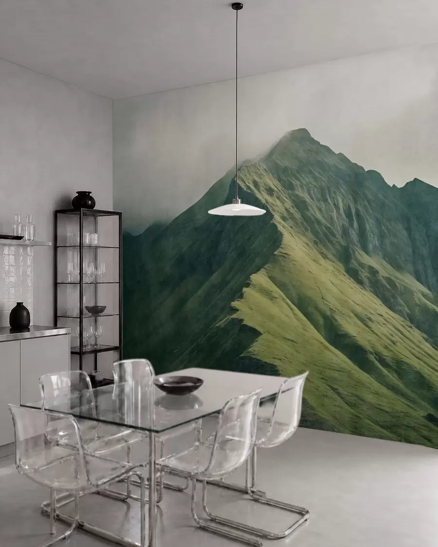 wall murals Mountain malachite with green slopes and a peak wrapped in soft mist w05820