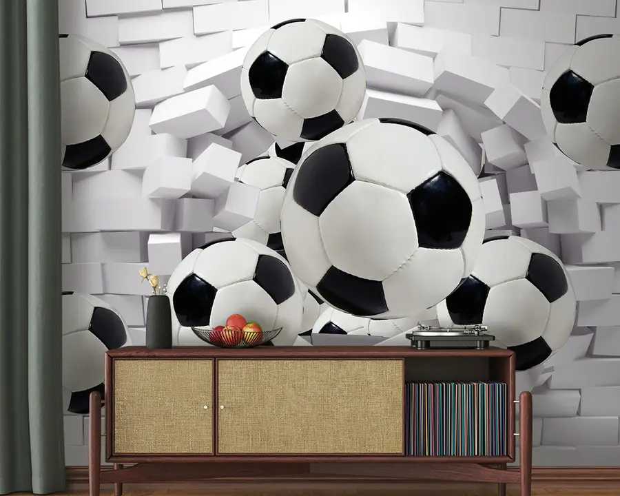wall murals Soccer balls on the background of a brick wall u94958